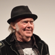 Neil Young, looking awfully pleased with himself